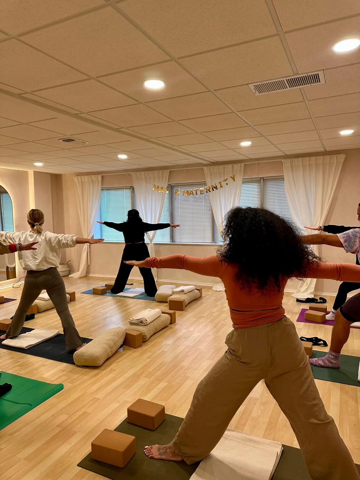 Prenatal yoga practice with supportive props